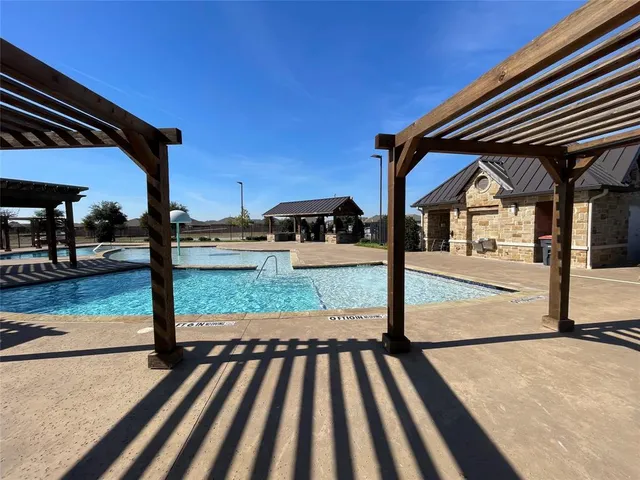 a view of a street with an outdoor space