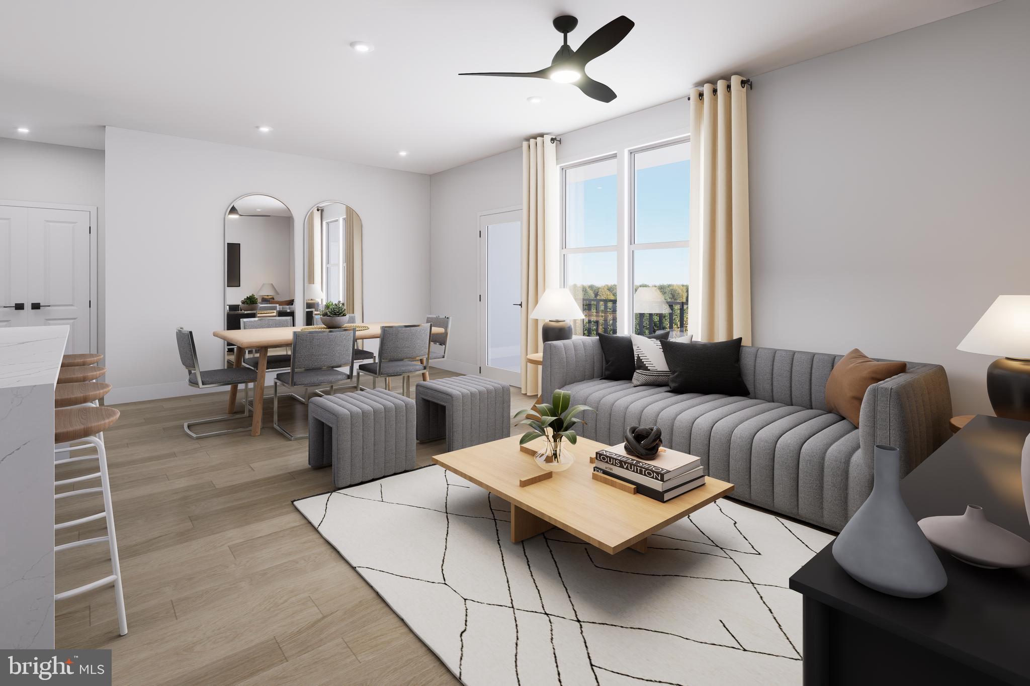 1121 Fortune Terrace, Unit 302 Potomac, MD 20854 - Photo 4 of 10 a living room with furniture and a large window