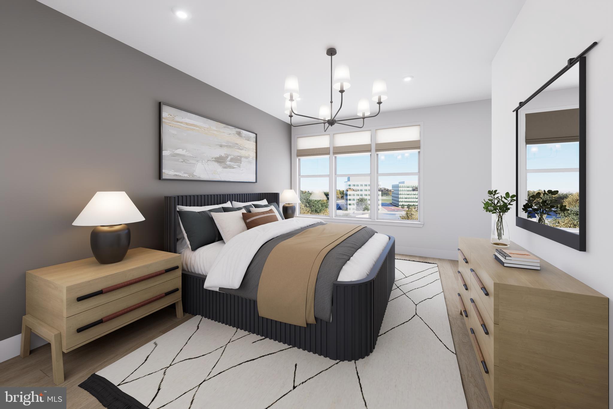 1121 Fortune Terrace, Unit 302 Potomac, MD 20854 - Photo 7 of 10 a bedroom with bed and window