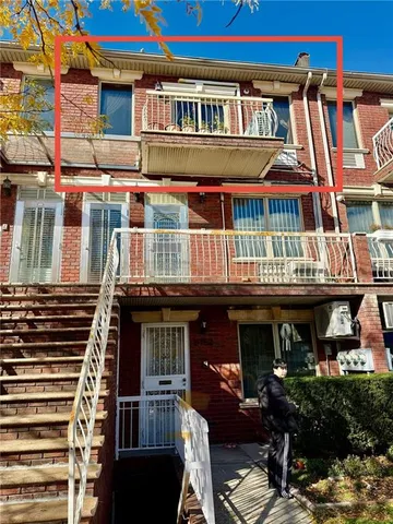 a front view of a building with balcony