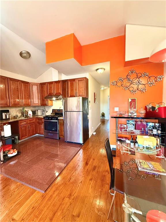 8752 18th Avenue, Unit 3E Brooklyn, NY 11214 - Photo 15 of 15 a swimming pool with chairs