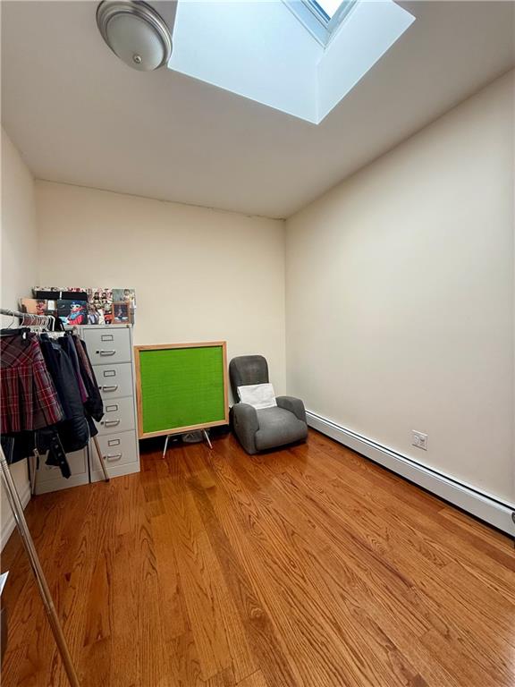 8752 18th Avenue, Unit 3E Brooklyn, NY 11214 - Photo 8 of 15 a view of a room with storage and utility