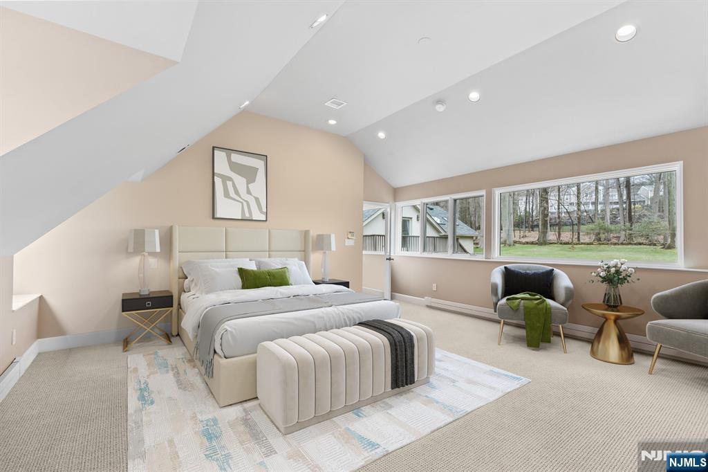 67 Forest Road Tenafly, NJ 07670 - Photo 19 of 42 a bedroom with a bed and a large window