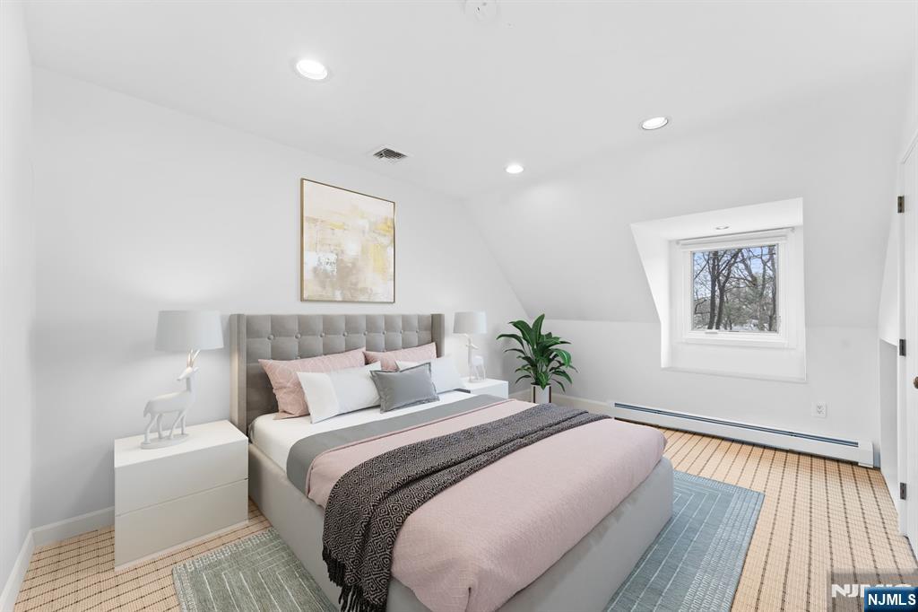 67 Forest Road Tenafly, NJ 07670 - Photo 23 of 42 a bedroom with bed and wooden floor