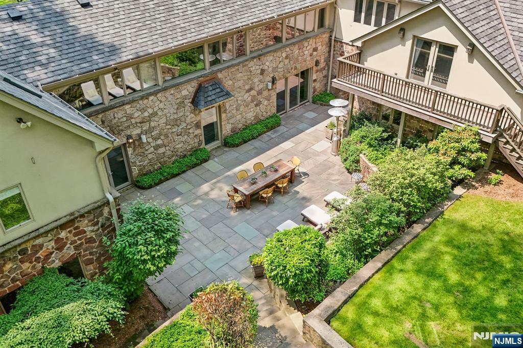 67 Forest Road Tenafly, NJ 07670 - Photo 29 of 42 an aerial view of a house with a yard
