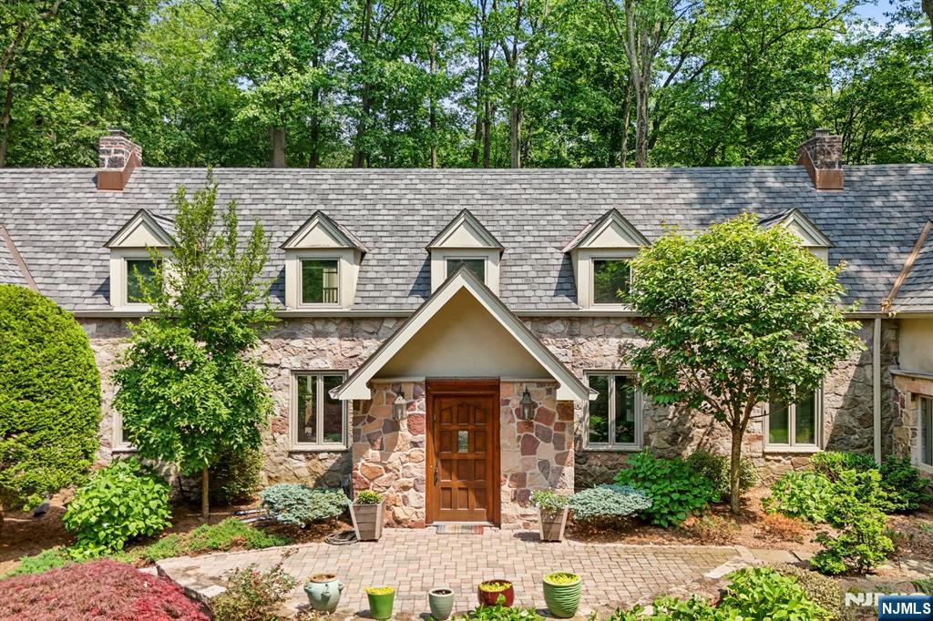 67 Forest Road Tenafly, NJ 07670 - Photo 30 of 42 front view of a house with a yard