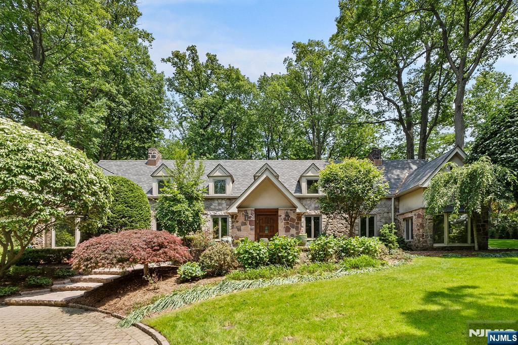67 Forest Road Tenafly, NJ 07670 - Photo 31 of 42 a aerial view of a house with a yard and large trees