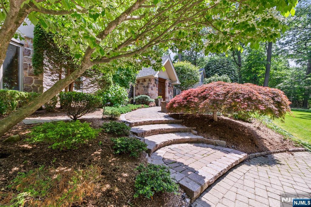 67 Forest Road Tenafly, NJ 07670 - Photo 32 of 42 a view of a backyard