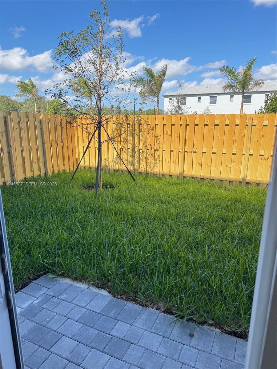 17953 Southwest 359th Street, Unit 17953 Homestead, FL 33034 - Photo 14 of 32 a view of swimming pool with an outdoor space and seating area