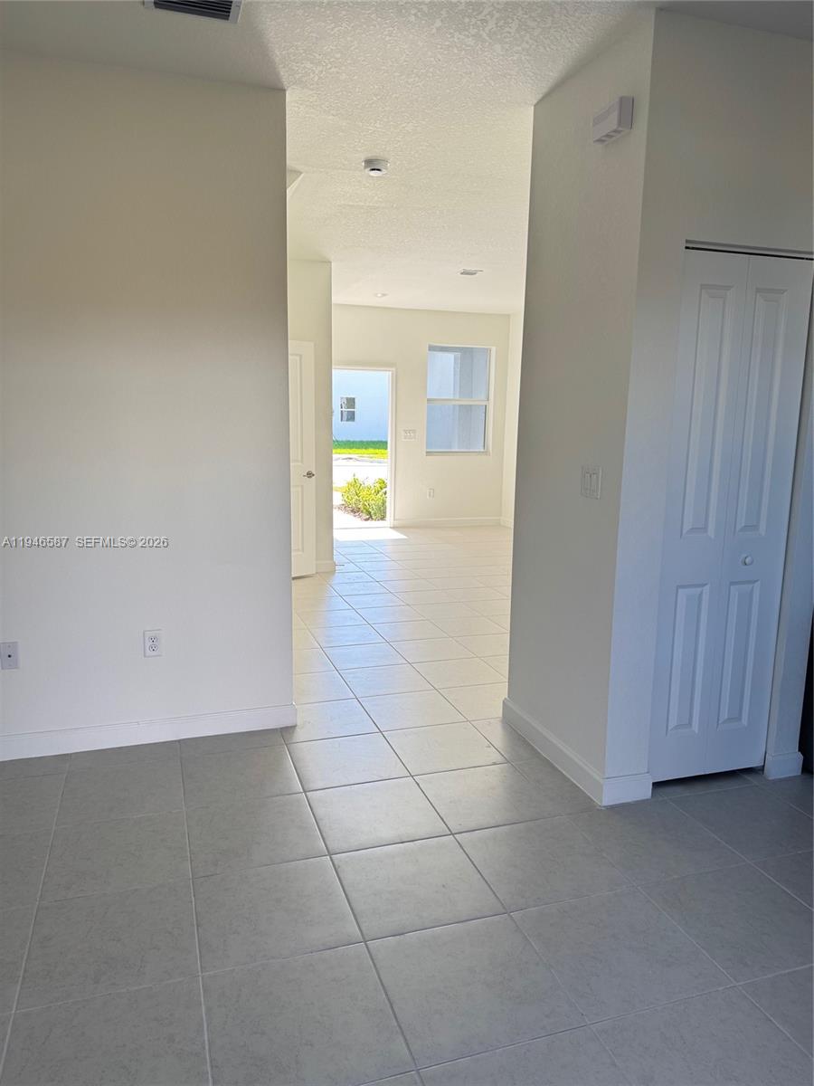 17953 Southwest 359th Street, Unit 17953 Homestead, FL 33034 - Photo 16 of 32 a view of a storage & utility room with a sink