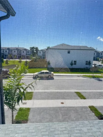 a view of swimming pool with outdoor seating and yard