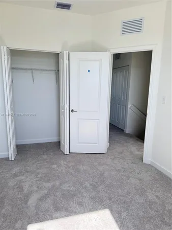 an empty room with closet