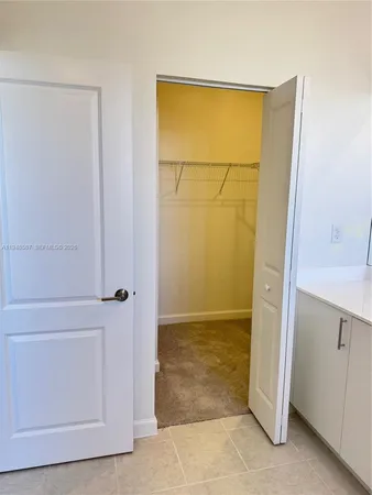 a view of a swimming pool and an outdoor seating