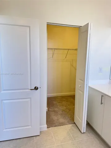 a view of a swimming pool and an outdoor seating