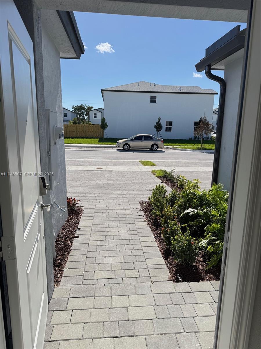 17953 Southwest 359th Street, Unit 17953 Homestead, FL 33034 - Photo 31 of 32 a view of car garage