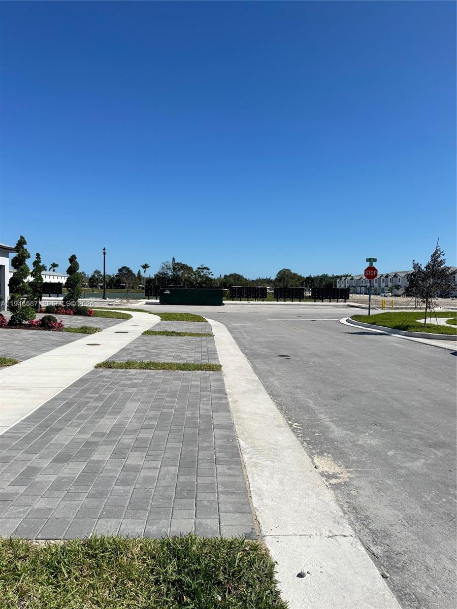 17953 Southwest 359th Street, Unit 17953 Homestead, FL 33034 - Photo 32 of 32 a view of lake with trees in background