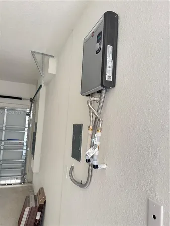 a bathroom with a mirror and a shower