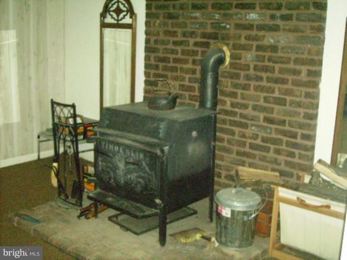 84 County Rte 9/11 Berkeley Springs, WV 25411 - Photo 8 of 22 woodstove