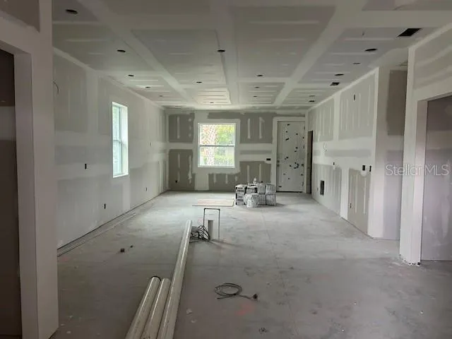 a room with gym equipment and window