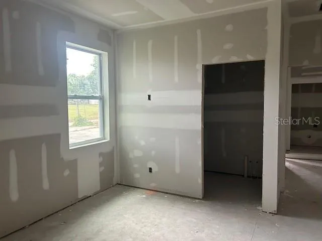 an empty room with windows