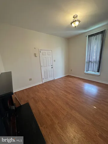 a view of a livingroom with a workspace