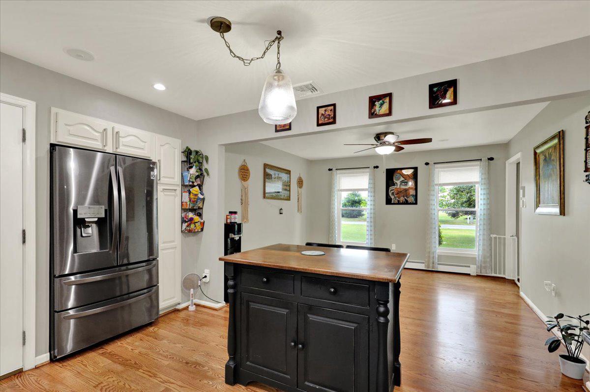 40 Hunters Run Road Honey Brook, PA 19344 - Photo 14 of 47 Bright and inviting kitchen space and dining room.