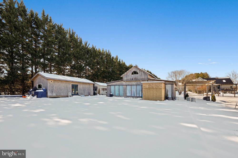 13710 Baden Naylor Road Upper Marlboro, MD 20772 - Photo 55 of 66 a view of a house with a big yard and large trees