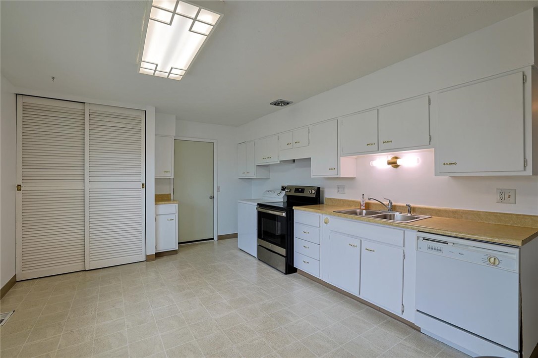 4307 Meadowcroft Road Dayton, OH 45429 - Photo 9 of 26 This spacious kitchen offers a functional layout with ample cabinet space.