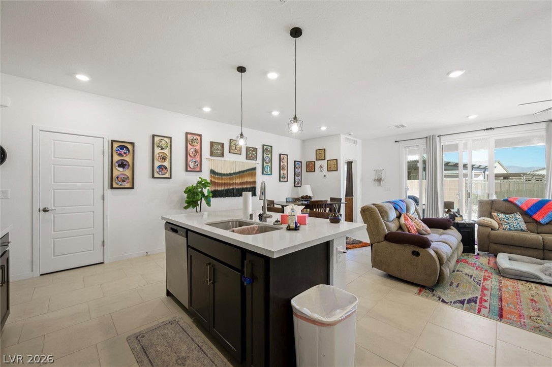 4743 South Springridge Street Pahrump, NV 89061 - Photo 11 of 50 Living area with recessed lighting, a ceiling fan, and light tile patterned floors