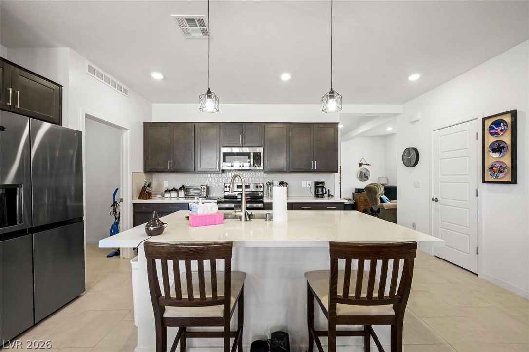 4743 South Springridge Street Pahrump, NV 89061 - Photo 20 of 50 Dining area with light tile patterned floors