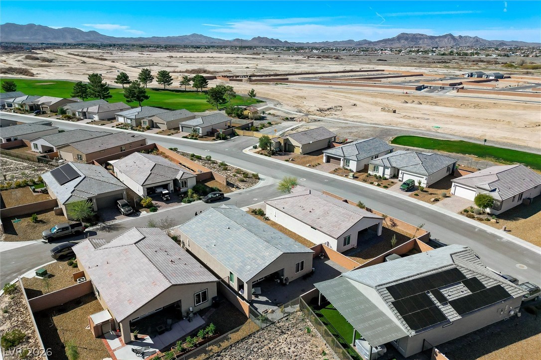 4743 South Springridge Street Pahrump, NV 89061 - Photo 43 of 50 Aerial perspective of suburban area with mountains