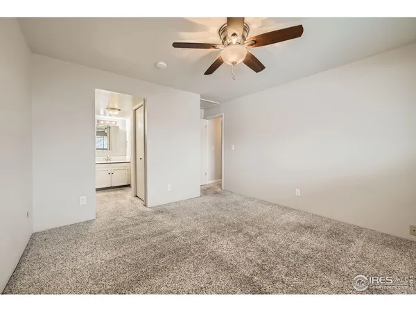 a view of a big room with carpet