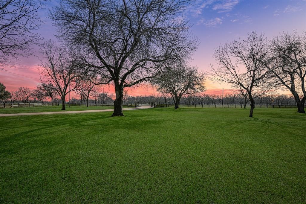 1038 Winner Foster Road Richmond, TX 77406 - Photo 19 of 37 a view of grassy field with benches