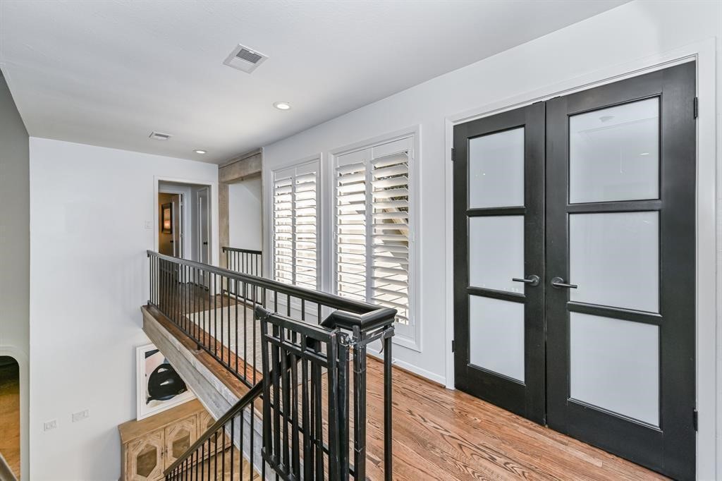 1038 Winner Foster Road Richmond, TX 77406 - Photo 26 of 37 a view of entryway with wooden floor and stairs