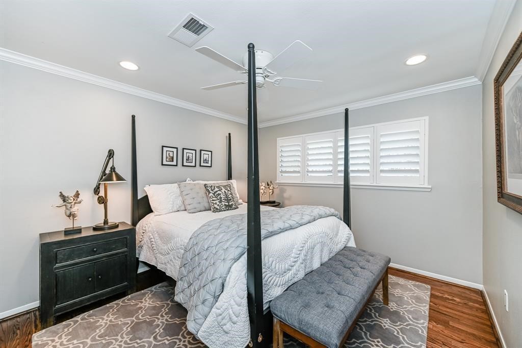 1038 Winner Foster Road Richmond, TX 77406 - Photo 28 of 37 a bed room with a bed and a lamp