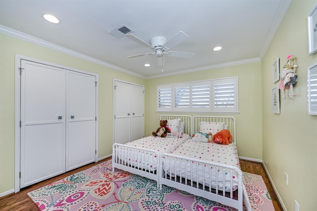 1038 Winner Foster Road Richmond, TX 77406 - Photo 30 of 37 a bed room with a bed and a window