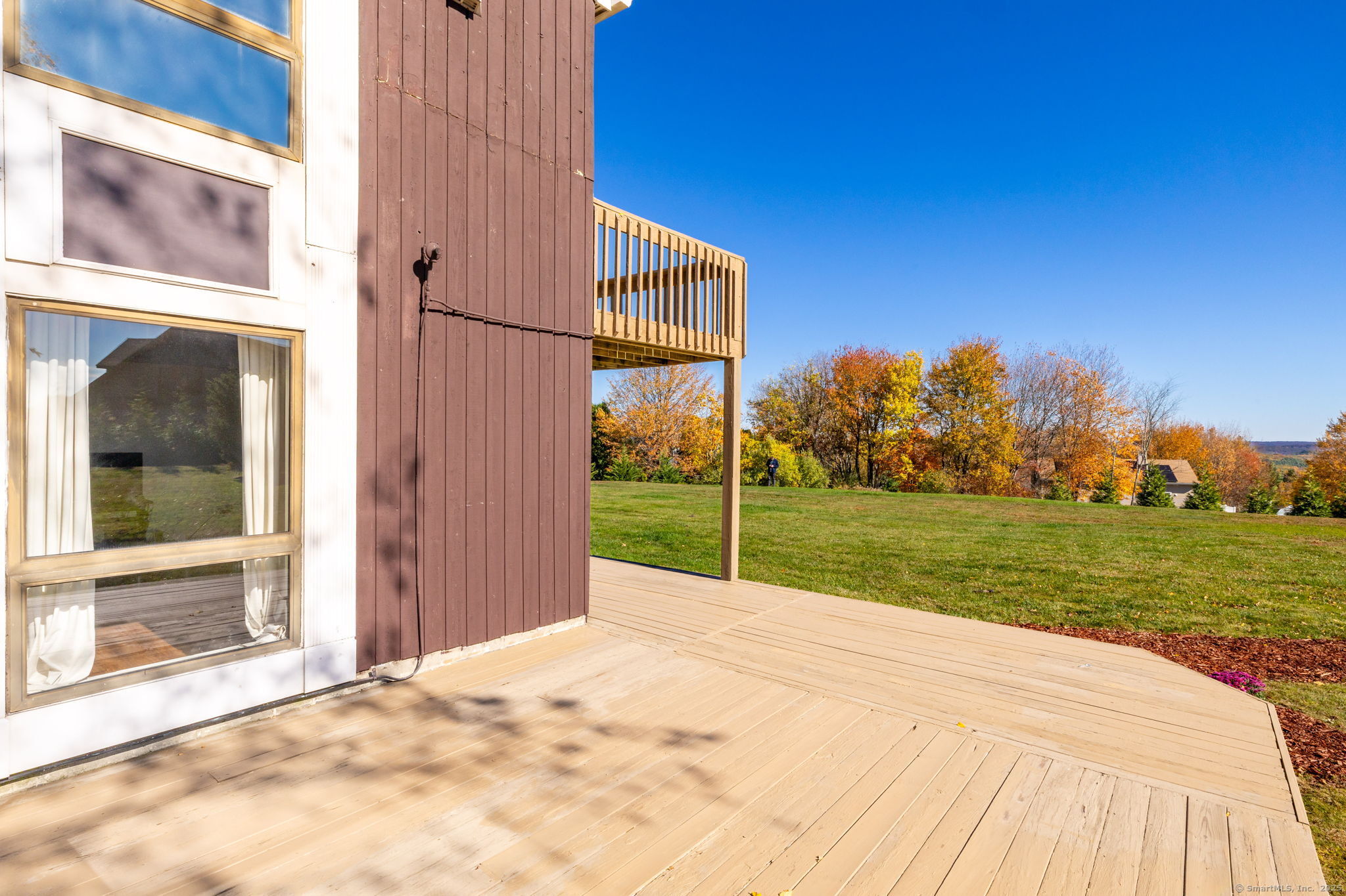 57 Bayview Circle Watertown, CT 06795 - Photo 12 of 40 a view of a house with backyard and trees