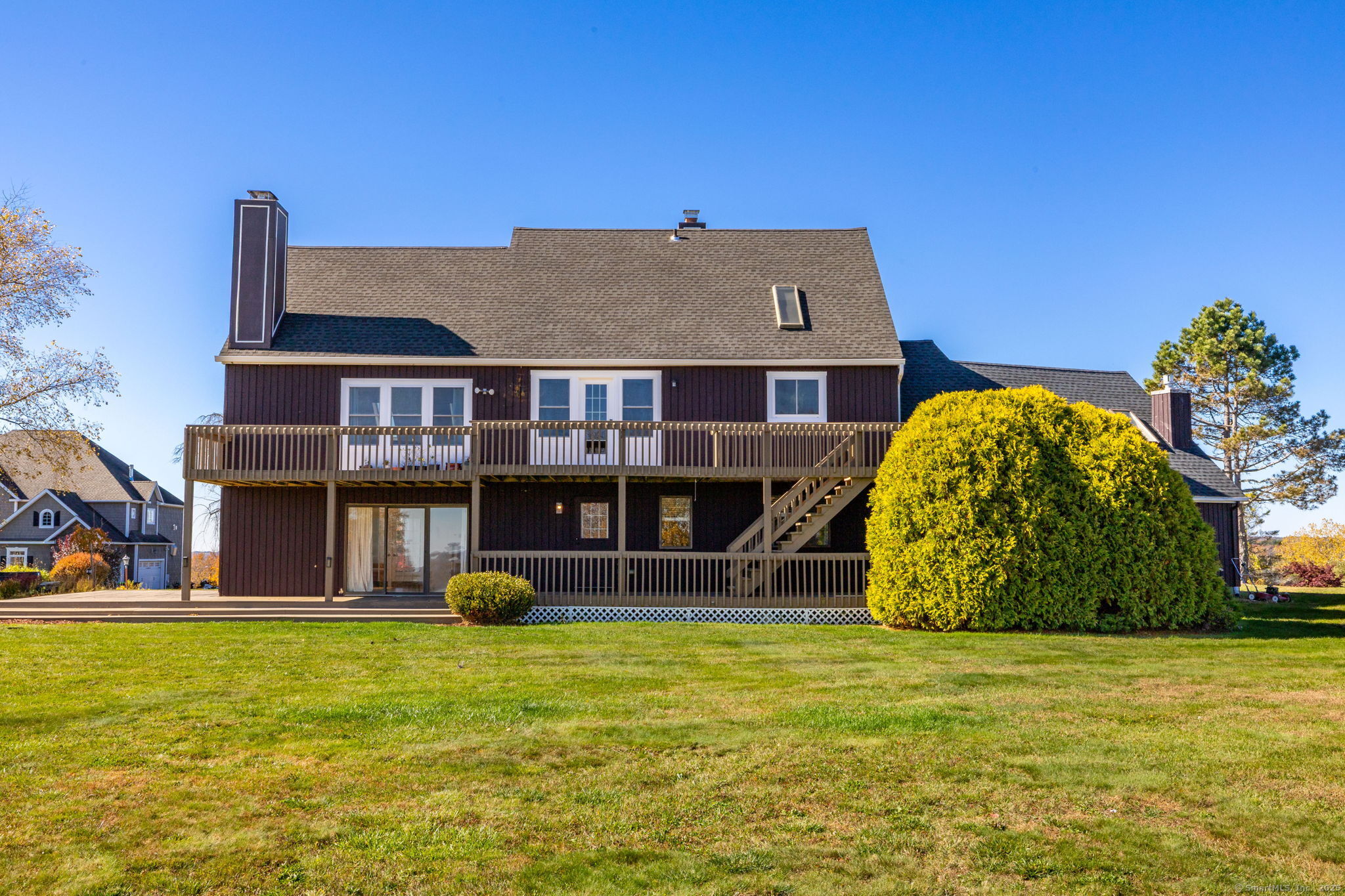 57 Bayview Circle Watertown, CT 06795 - Photo 13 of 40 a view of a house with a backyard
