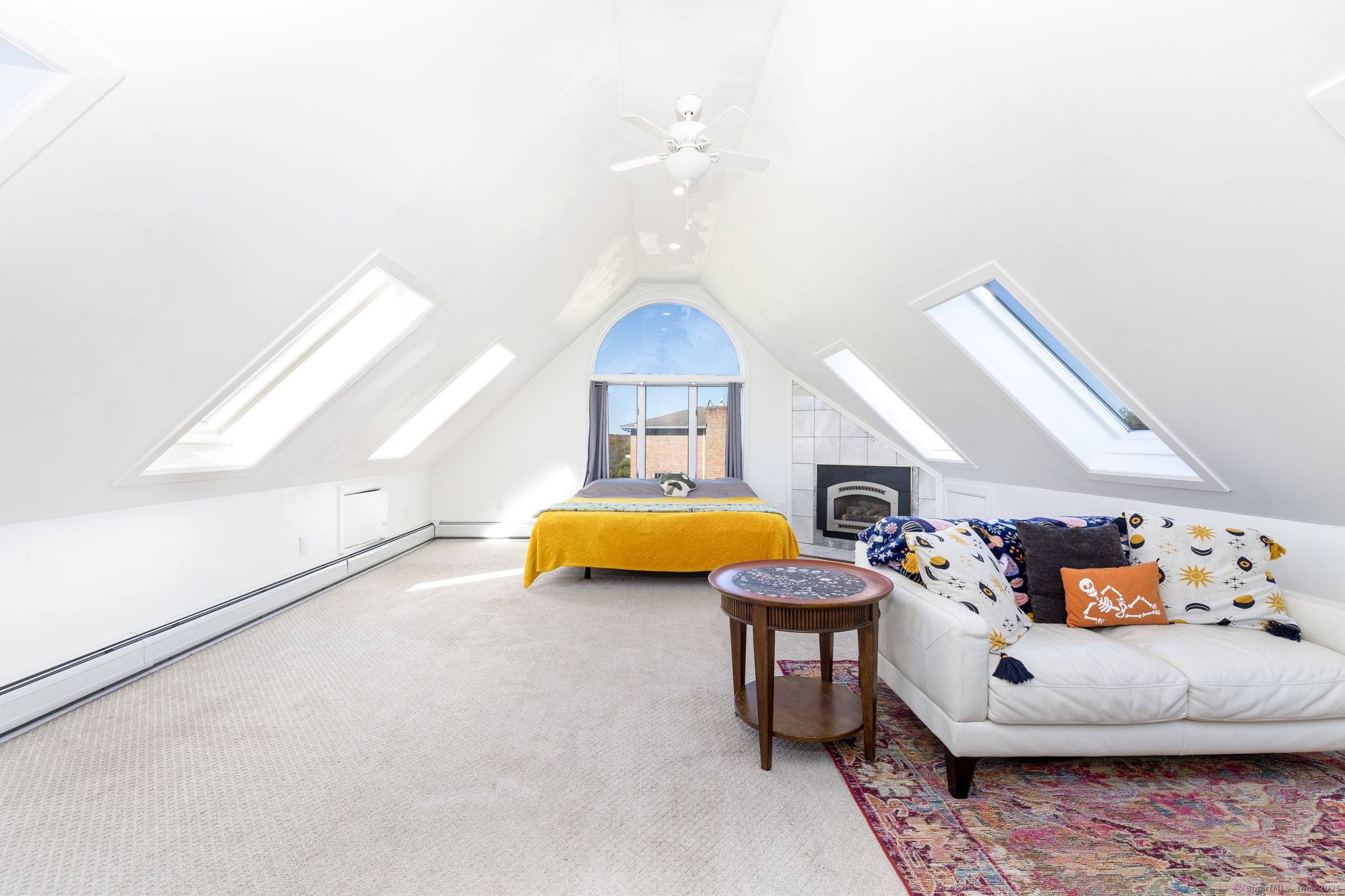 57 Bayview Circle Watertown, CT 06795 - Photo 23 of 40 a living room with furniture and a chandelier
