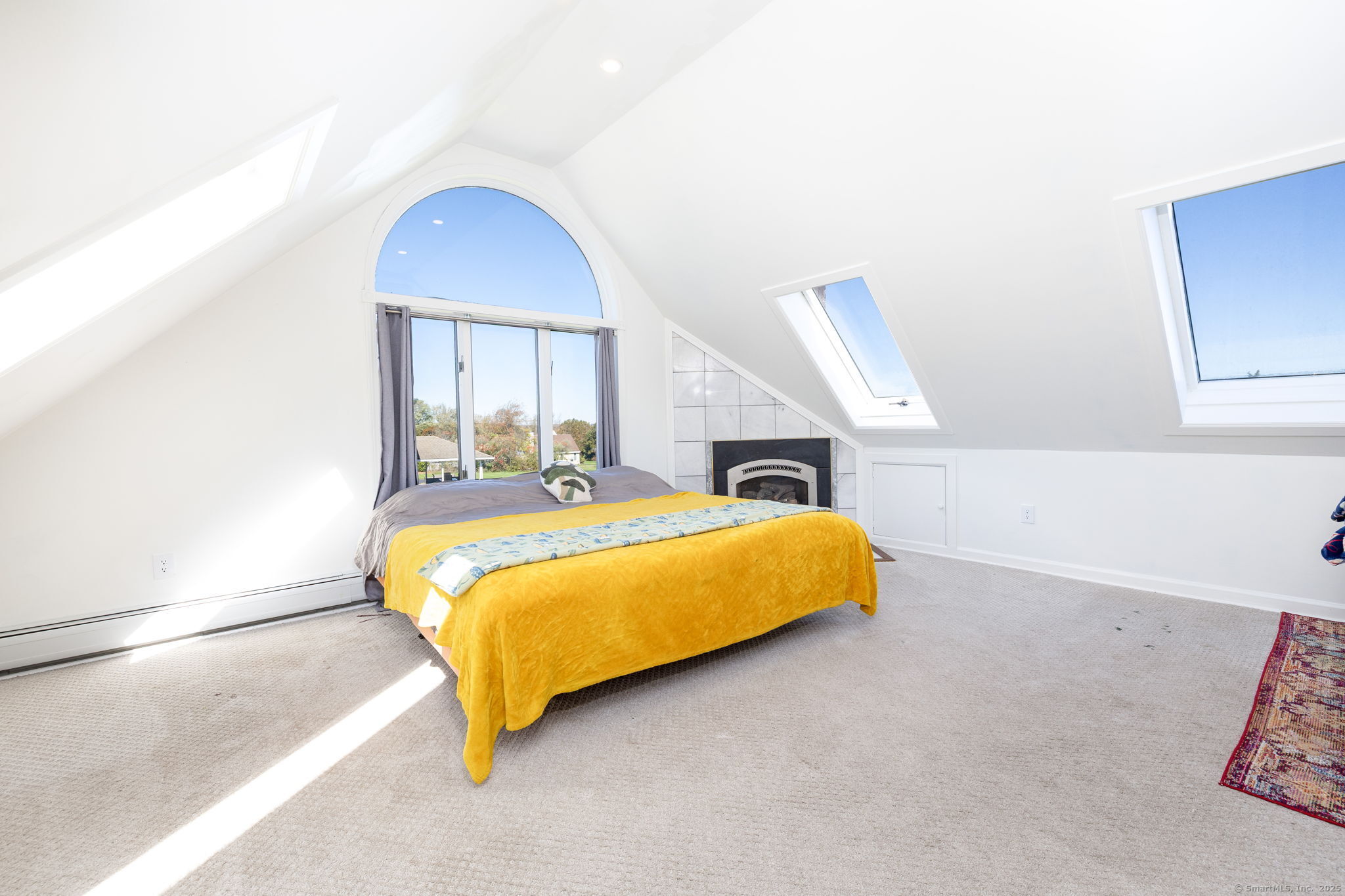 57 Bayview Circle Watertown, CT 06795 - Photo 24 of 40 a bed sitting in a bedroom next to a window