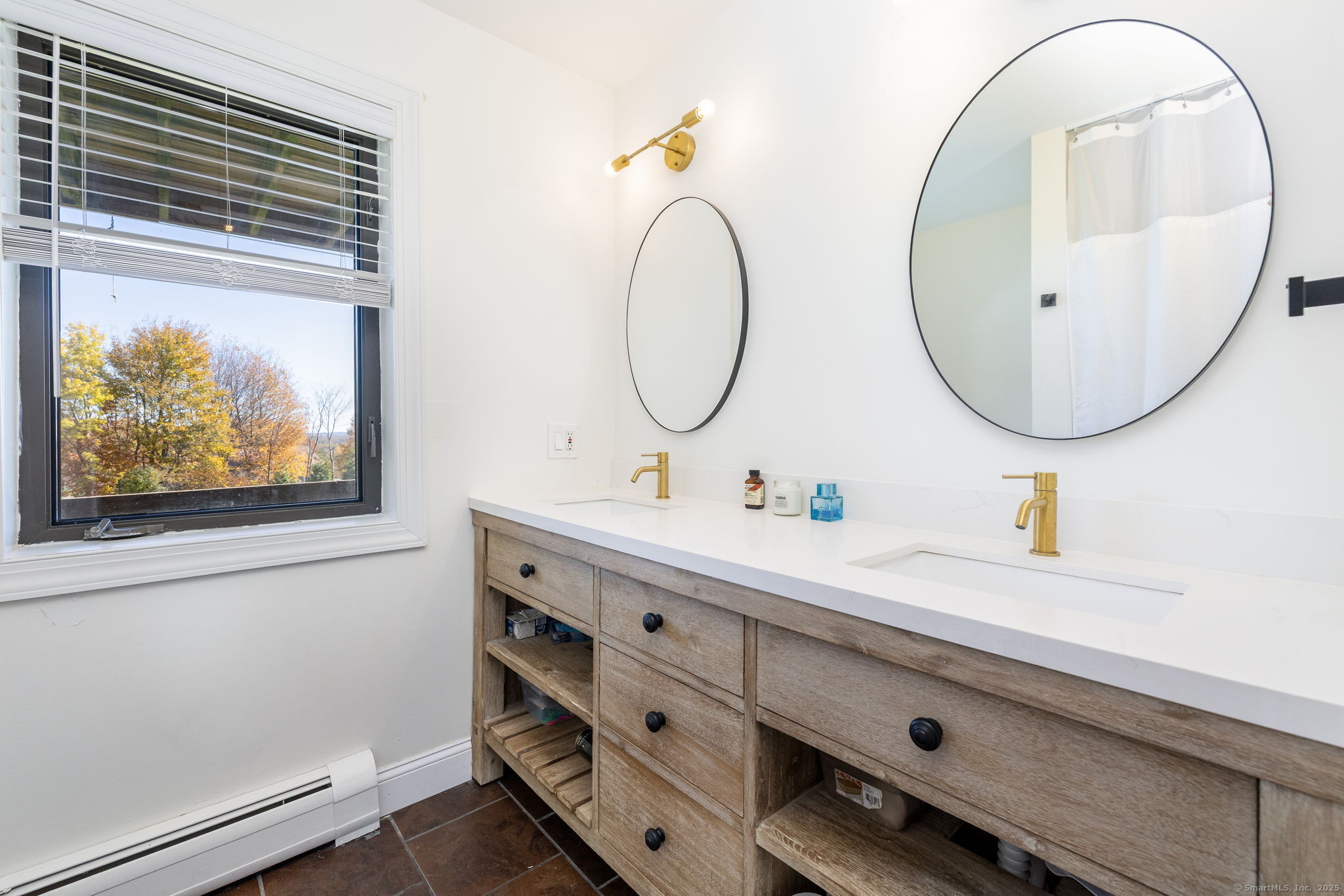 57 Bayview Circle Watertown, CT 06795 - Photo 35 of 40 a bathroom with a sink and a mirror