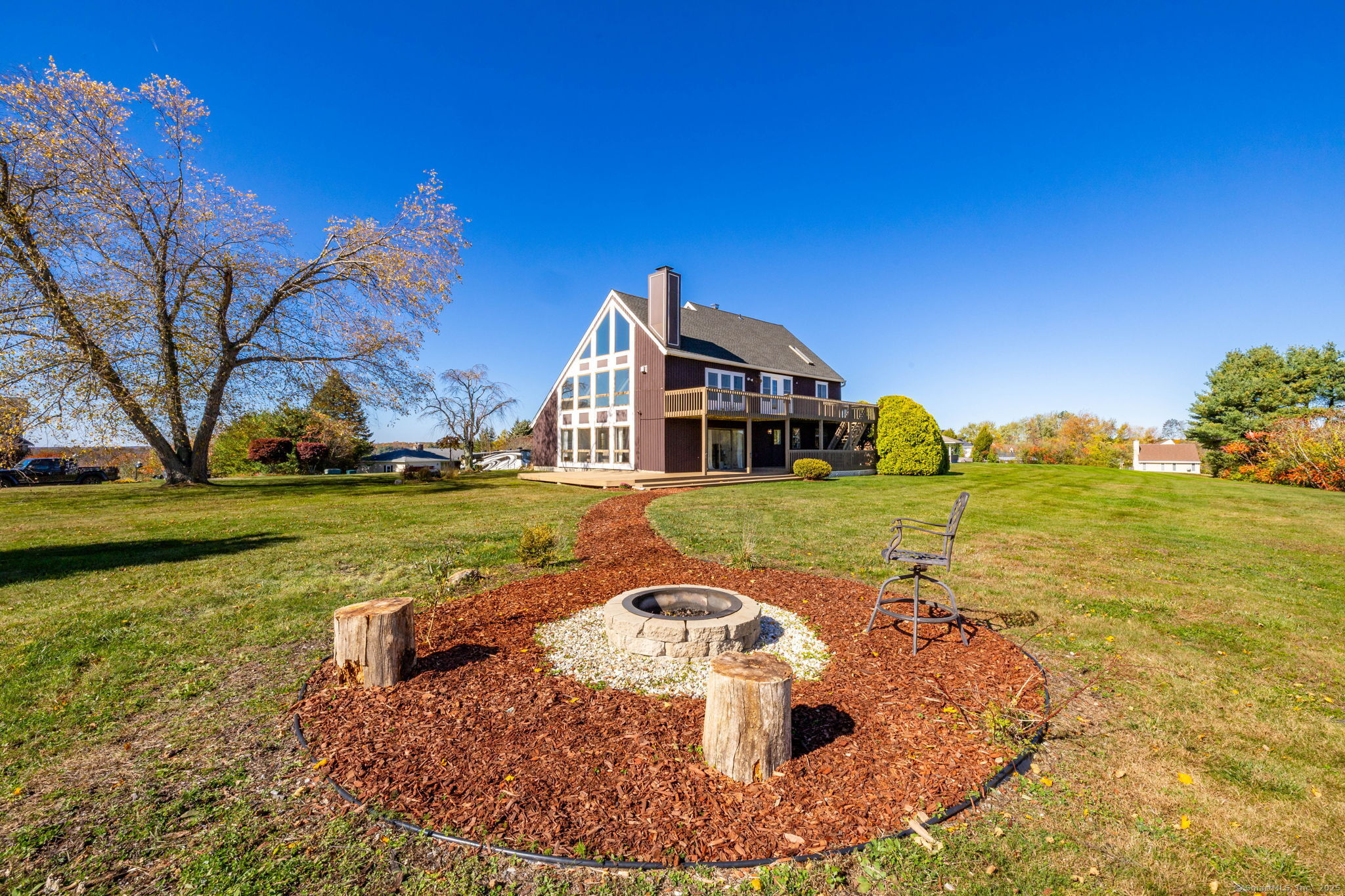 57 Bayview Circle Watertown, CT 06795 - Photo 37 of 40 a view of a house with a yard