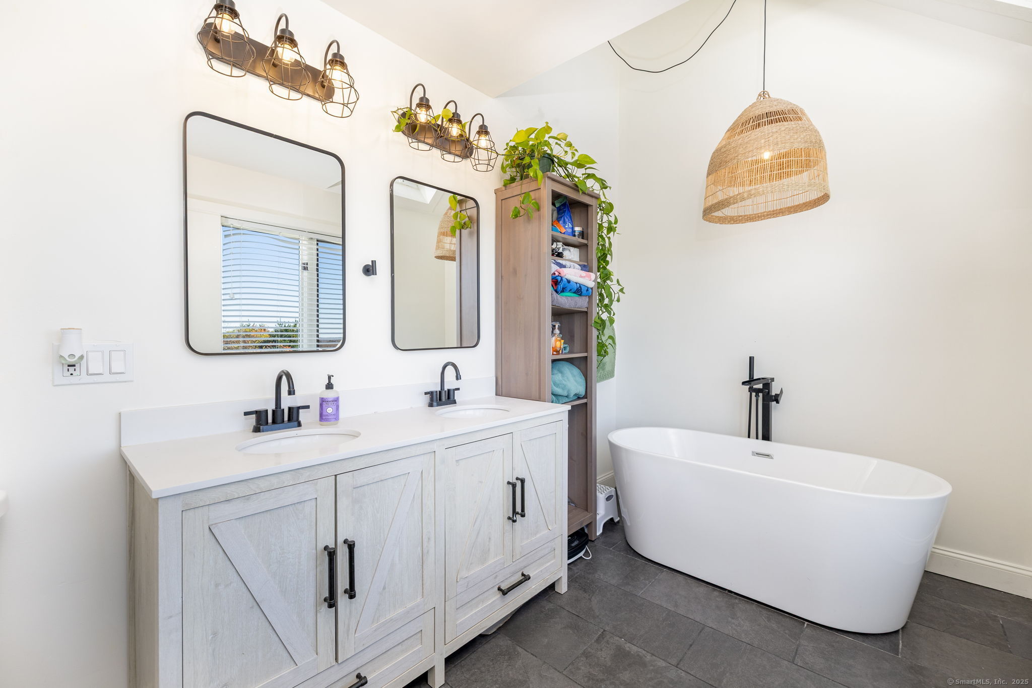 57 Bayview Circle Watertown, CT 06795 - Photo 6 of 40 a bathroom with a sink and a mirror