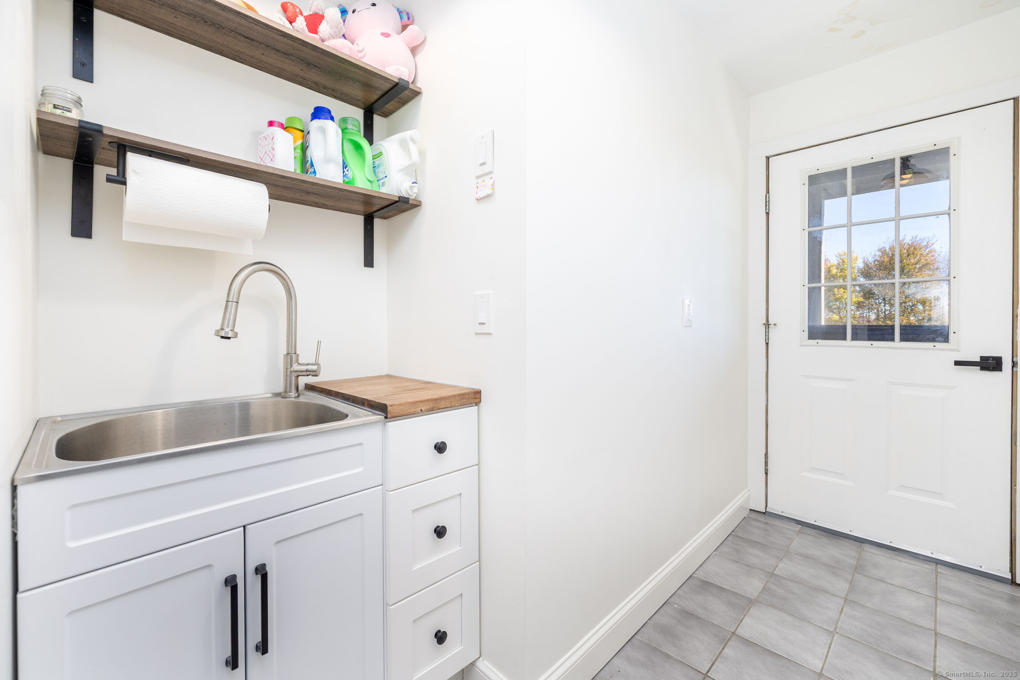 57 Bayview Circle Watertown, CT 06795 - Photo 9 of 40 a close view of sink and tap