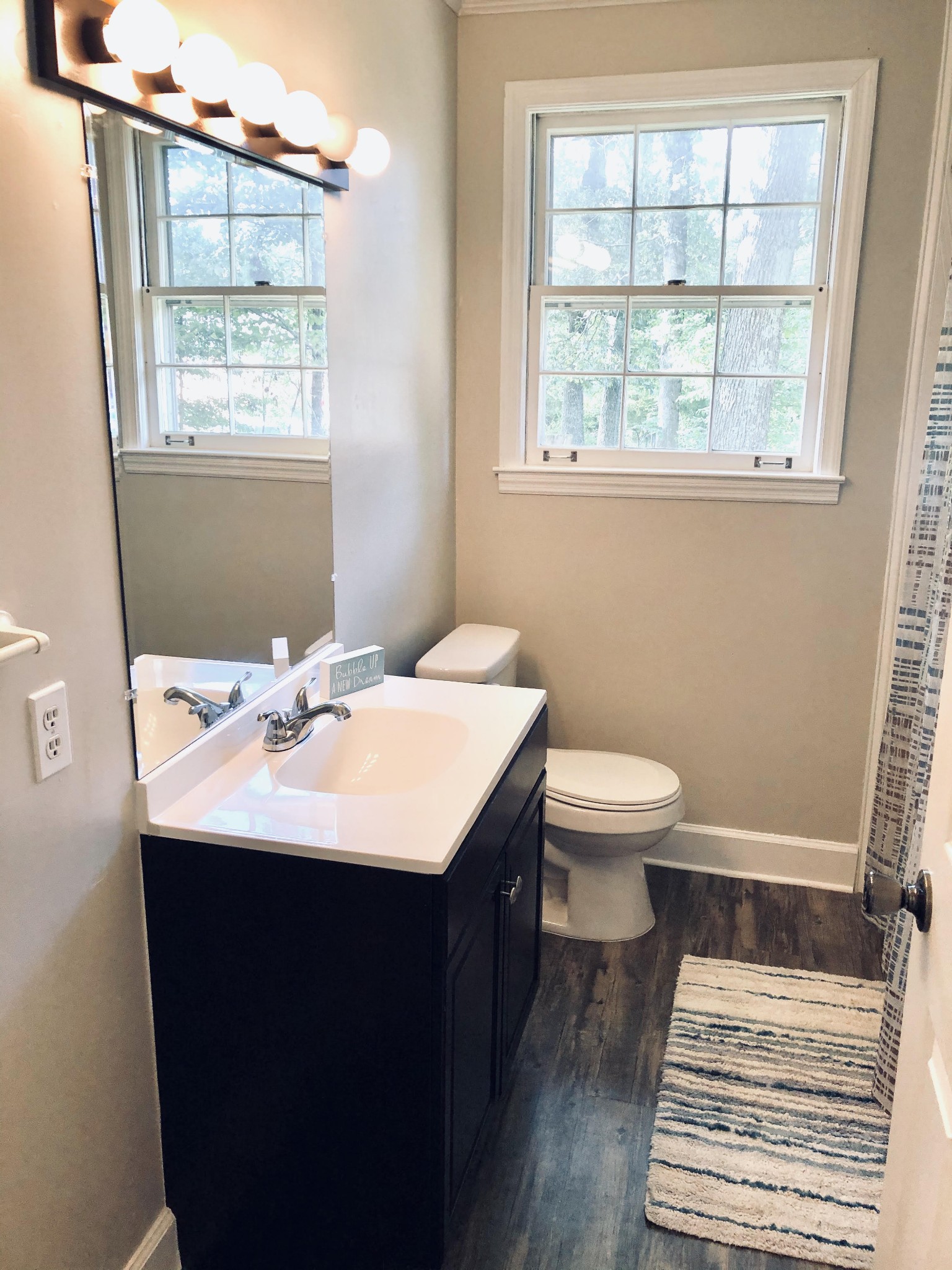 225 Yorktown Road Clarksville, TN 37042 - Photo 8 of 10 a bathroom with a sink toilet and window
