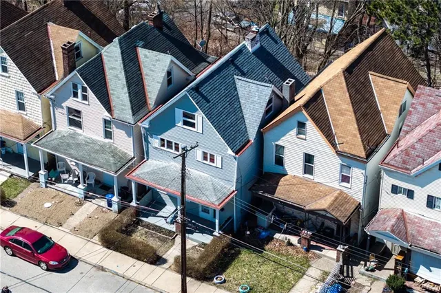 an aerial view of multiple house
