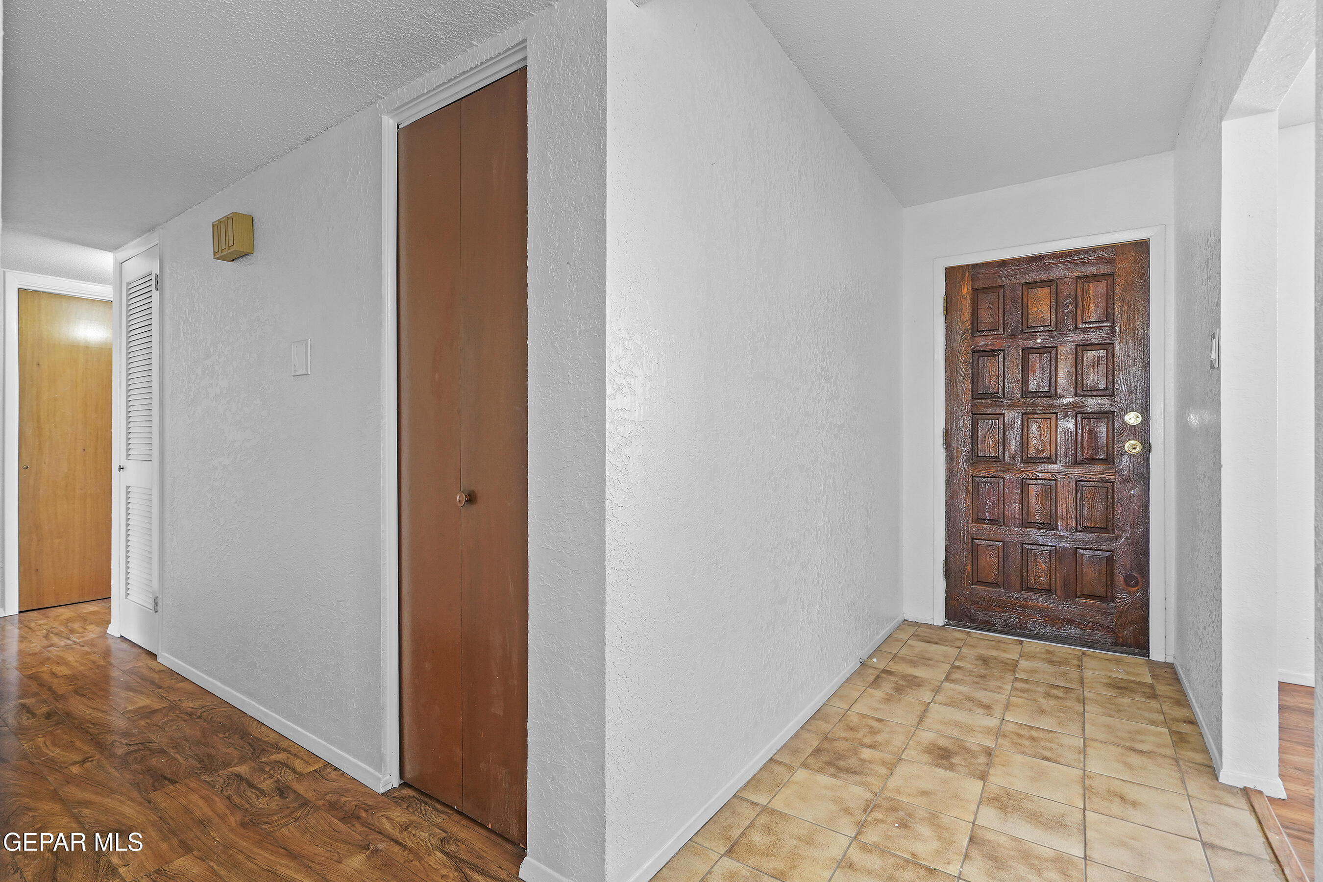 416 San Saba Road El Paso, TX 79912 - Photo 11 of 41 a view of room with window and wooden floor