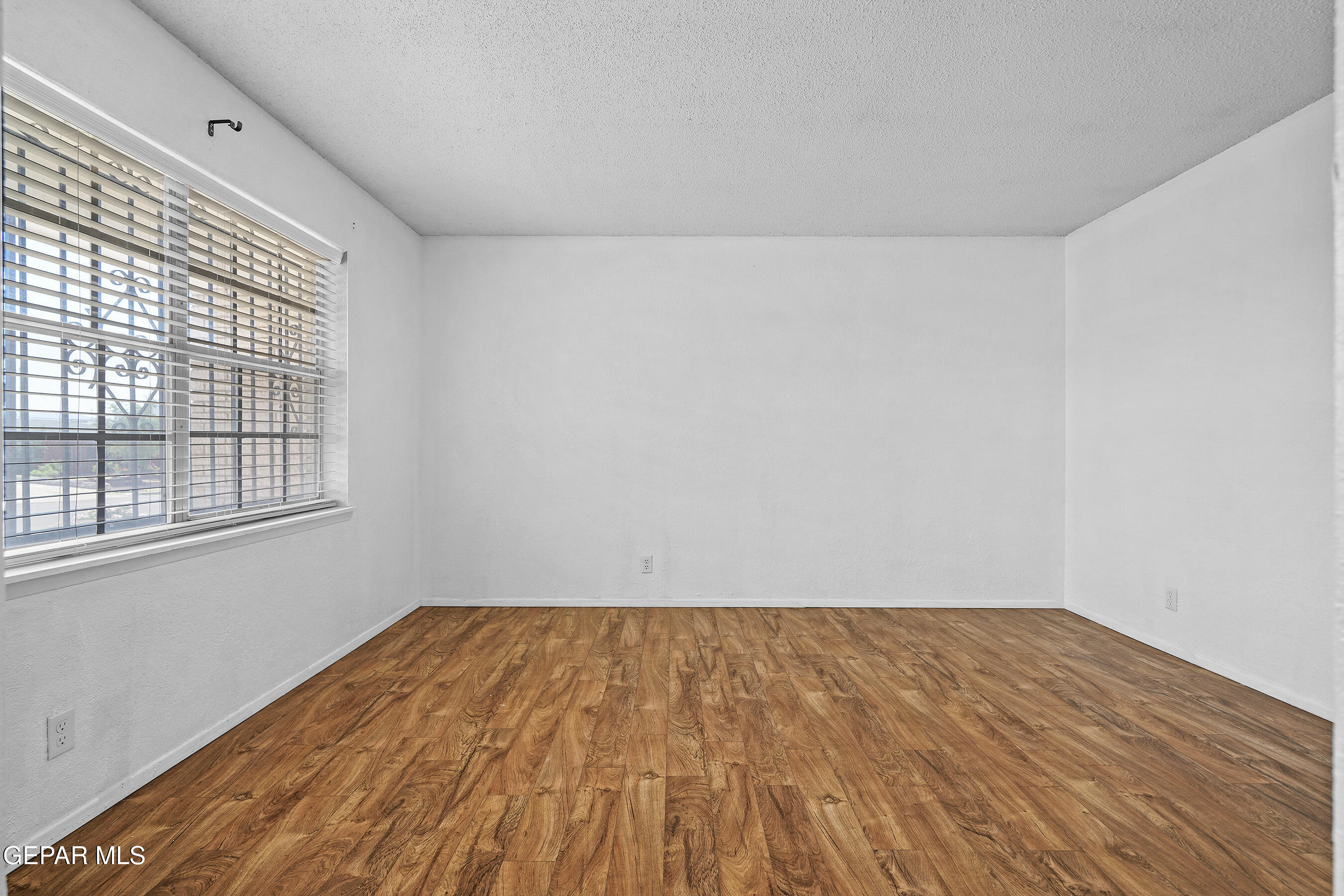 416 San Saba Road El Paso, TX 79912 - Photo 17 of 41 wooden floor in a room