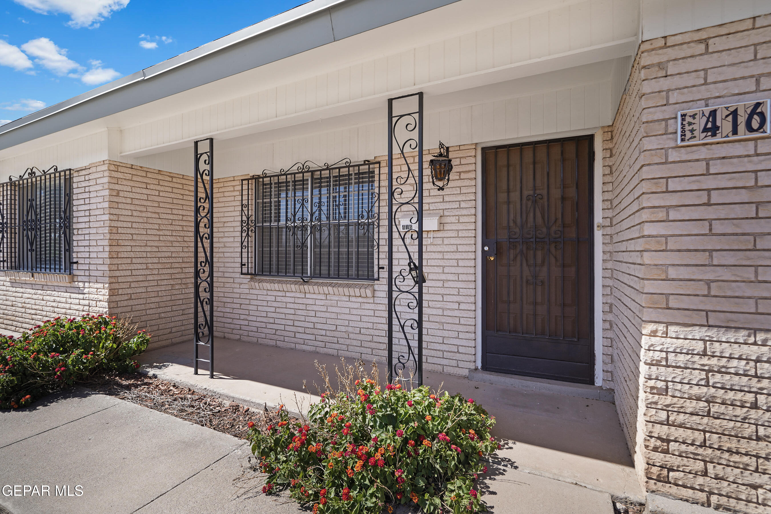416 San Saba Road El Paso, TX 79912 - Photo 2 of 41 a view of a entryway door front of house