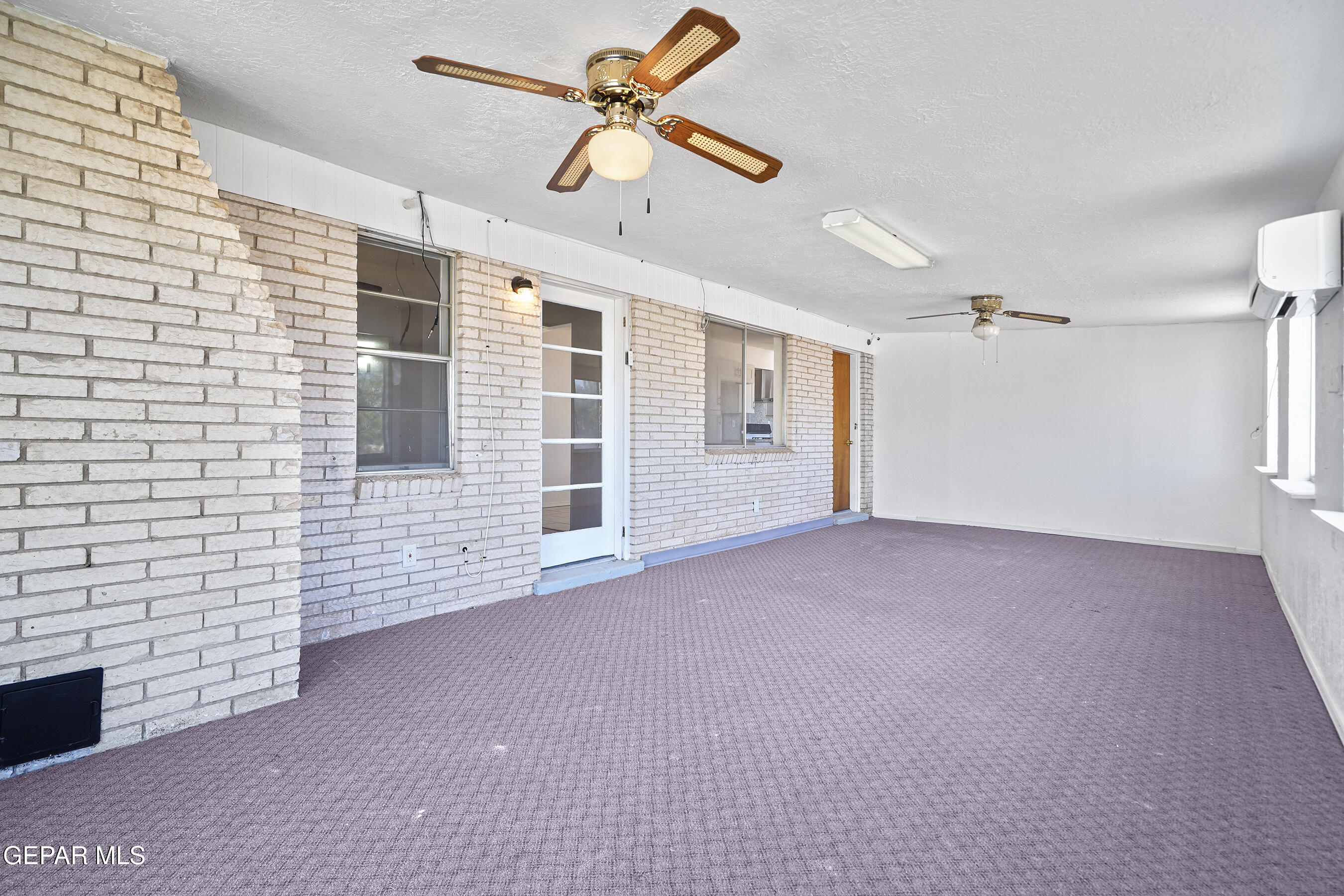 416 San Saba Road El Paso, TX 79912 - Photo 22 of 41 a view of empty room with ceiling fan